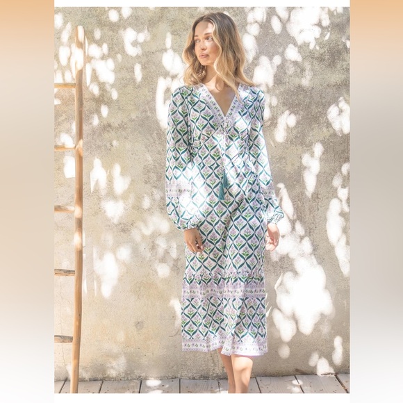 SunnySpirit Dresses & Skirts - Sunny Spirit Maxi Boho Floral Print V Neck Flowy Tassel with Long Puff Sleeves.